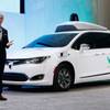 John Krafcik, CEO of Waymo, the autonomous vehicle company created by Google's parent company, Alphabet, introduces a Chrysler Pacifica hybrid outfitted with Waymo's own suite of sensors and radar Sunday, Jan. 8, 2017, at the North American International Auto Show in Detroit.