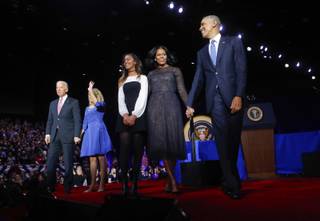 President Barack Obama walks on stage with first lady Michelle Obama, daughter Malia, Vice President Joe Biden and his wife Jill Biden after his farewell address at McCormick Place in Chicago, Tuesday, Jan. 10, 2017. (AP Photo/Pablo Martinez Monsivais)