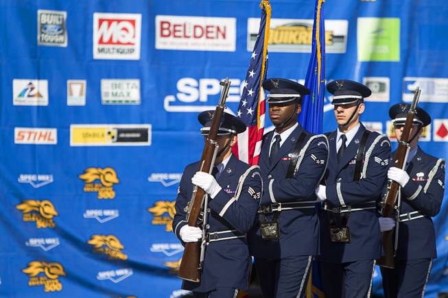An honor guard from Nellis Air Force Base presents the colors for the 15th Anniversary Spec Mix Bricklayer 500 during the World of Concrete convention at the Las Vegas Convention Center Wednesday, Jan. 18, 2017. Top masons from across North America, and one from England, competed to build the best brick wall in one hour.