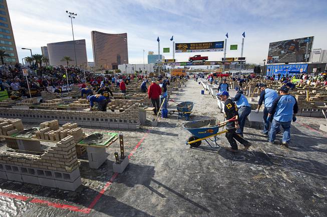 A view of the competition area in the 15th Anniversary Spec Mix Bricklayer 500 during the World of Concrete convention at the Las Vegas Convention Center Wednesday, Jan. 18, 2017. Top masons from across North America, and one from England, competed to build the best brick wall in one hour.