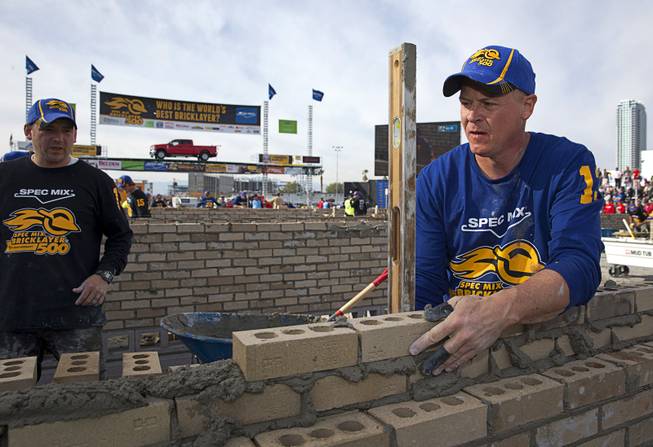 Darian Douthitt, of Providence Masonry in Miami, Okla., competes in the 15th Anniversary Spec Mix Bricklayer 500 during the World of Concrete convention at the Las Vegas Convention Center Wednesday, Jan. 18, 2017. Douthitt was a 2016 Spec Mix Top Craftsman winner. Top masons from across North America, and one from England, competed to build the best brick wall in one hour.
