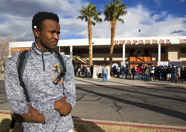 Tre Roberts, a Chaparral High School basketball and football player, stands by the school following a memorial service for former Chaparral athlete Richard Nelson at the school Thursday, Jan. 19, 2017. Nelson was shot and killed Saturday while attempting to break up a fight involving his sister.