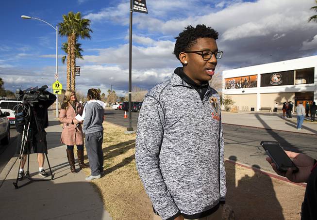 Chaparral High School senior Lorenzo Woods is interviewed following a memorial service for former Chaparral High star athlete Richard Nelson at Chaparral High School Thursday, Jan. 19, 2017. Nelson was shot and killed Saturday while attempting to break up a fight involving his sister.