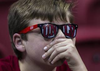 A young UNLV fan shows his concern as Air Force takes the lead during their game at the Thomas & Mack Center on Saturday, Jan. 21, 2017.