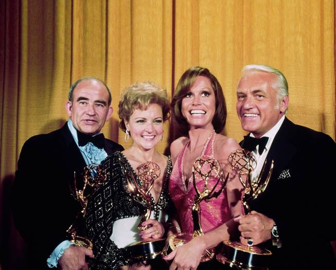 LOS ANGELES, CA - MAY 17, 1976: (L-R) "The Mary Tyler Moore Show" co-stars - Ed Asner, Betty White, Mary Tyler Moore and Ted Knight - all won awards at the Academy of Television Arts & Sciences 28th Annual Primetime Emmy Awards held at the Shubert Theatre on May 17, 1976 in Los Angeles, California. (Photo by TVA/PictureGroup/Invision for the Academy of Television Arts & Sciences/AP Images)