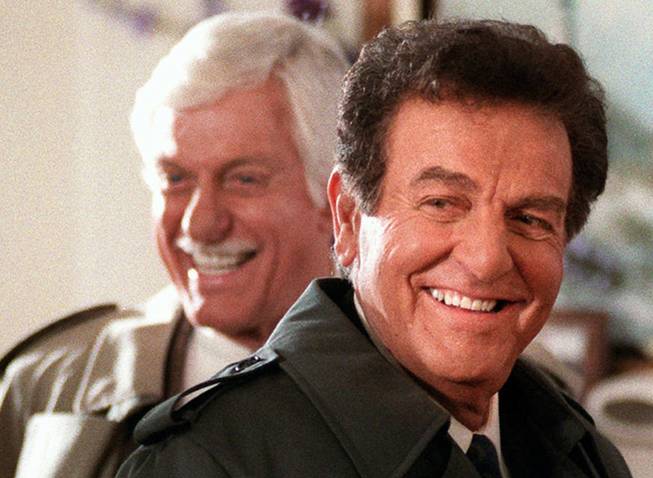 This Jan. 15, 1997, file photo, actor Mike Connors, right, appears with actor Dick Van Dyke during an episode of the television show "Diagnosis Murder," in Los Angeles.