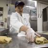 Raquel Flores makes tamales from scratch at Gardunos of Mexico inside the Fiesta Rancho, Tuesday, Jan. 17, 2017.
