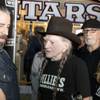 Country music legend Willie Nelson speaks to fans during an event celebrating the collaboration between Willie's Reserve and Redwood Cultivation at Exile on Main Street in downtown Las Vegas, Tuesday Jan. 31, 2017.