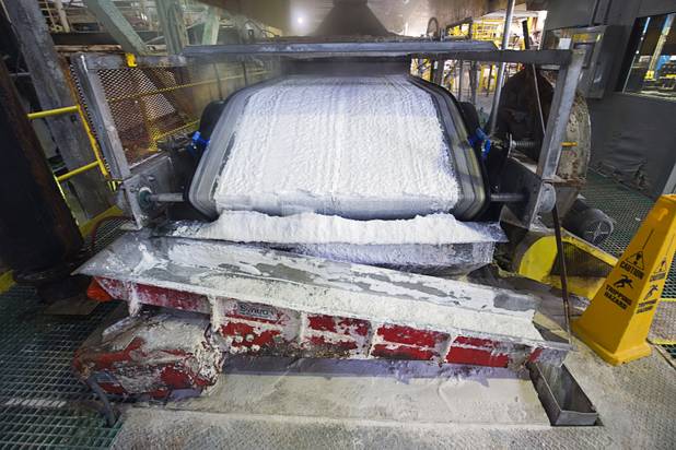 Technical grade lithium carbonate comes off a conveyor belt during a tour of the Silver Peak lithium mine near Tonopah, Nev. Monday, Jan. 30, 2017.