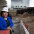 Virginia Toalepai, president of World Wide Safety, a health and safety service company, poses at a construction site at the Monte Carlo Monday, Feb. 6, 2017. 