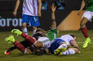 Mexico Forward Alan Pulido (9) signals for a foul over the Iceland goalie during their   men's national soccer team at Sam Boyd Stadium before a projected record crowd on Wednesday, Feb. 8, 2017.