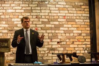 Geoff Schumacher, Senior Director of Content at the Mob Museum, speaks to the media regarding some newly added artifacts to The Mob Museum, Friday Feb. 10, 2017. The artifacts were involved in the St. Valentine's Day Massacre in Chicago, 1929, and include various items such as bullets removed from the bodies of the victims and original coroner's documents.