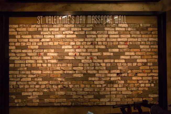 The original brick wall where the St. Valentine's Day Massacre took place is on display at The Mob Museum, Friday Feb. 10, 2017. The wall is now joined by newly added artifacts that were involved in the massacre back in Chicago in 1929, and include various items such as bullets removed from the bodies of the victims and original coroner's documents.