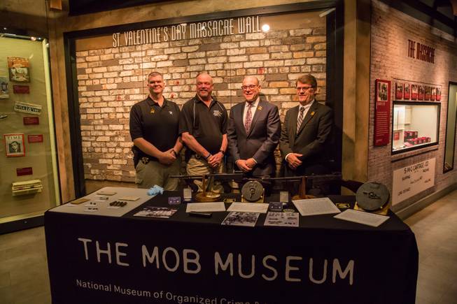 From left; Lt. Jeff Duffield and Lt. Mike Kline, from the Berrien Co. Sherriff's Department, Mob Museum Executive Dir. and CEO Jonathan Ullman, and Geoff Schumacher, Senior Director of Content at the Mob Museum Friday Feb. 10, 2017. The Mob Museum holds a media event to welcome newly added artifacts that were involved in the St. Valentine's Day Massacre in Chicago, 1929, and include various items such as bullets removed from the bodies of the victims and original coroner's documents.