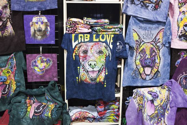 Dean Russo psychedelic dog design t-shirts are seen on display during the annual Pet Expo at the World Market Pavilion, Saturday, Feb. 11, 2017.