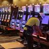 Workers wire new electronic games at the new 20-story Wind Creek Wetumpka, a gaming casino owned by the Poarch Band of Creek Indians under construction in Wetumpka, Ala., Thursday, Oct. 24, 2013. The casino will open Dec. 17 and the hotel in late January or early February. The project cost $250 million and will replace a smaller casino the Creeks have operated next door. 
