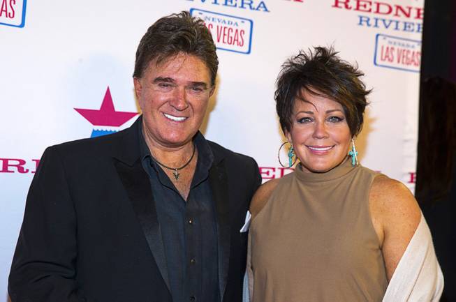County singer T.J. Sheppard and his wife Kelly Lang arrive for the grand opening of John Rich's Redneck Riviera, a country bar in the Grand Bazaar Shops in front of Bally's, Thursday, Feb. 16, 2017. .