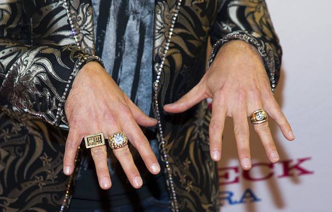 Country singer John Rich, of the music duo Big & Rich, displays his rings during the grand opening of Redneck Riviera, a country bar in the Grand Bazaar Shops in front of Bally's, Thursday, Feb. 16, 2017. .