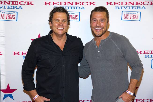 "The Bachelor" reality TV personalities Bob Guiney, left, and Chris Soules arrive for the grand opening of John Rich's Redneck Riviera, a country bar in the Grand Bazaar Shops in front of Bally's, Thursday, Feb. 16, 2017. .
