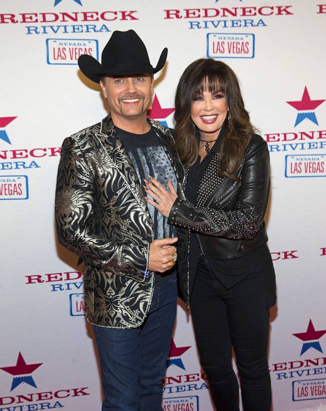 Country singer John Rich, of the music duo Big & Rich, and Marie Osmond arrive for the grand opening of Redneck Riviera, a country bar in the Grand Bazaar Shops in front of Bally's, Thursday, Feb. 16, 2017. .
