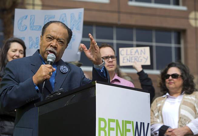 Rev. Leonard Jackson of the 1st A.M.E. Church speaks during a clean energy rally in front of the Sawyer State Building Monday, Feb. 20, 2017.