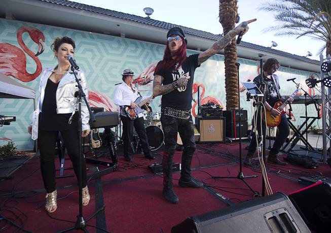 "Rock Fantasy's" Colby Vell, center, performs as Axel Rose during a Rock 4 Freedom Rally at Hooters Casino Monday, Feb. 20, 2017. Proceeds from the concert benefited the Nevada ACLU. .