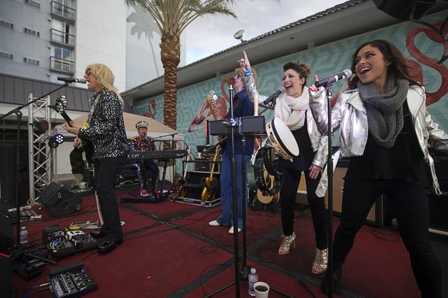 Backup singers perform with Elton John tribute artist Kenny Metcalf and the Early Years Band during a Rock 4 Freedom Rally at Hooters Casino Monday, Feb. 20, 2017. Proceeds from the concert benefited the Nevada ACLU. .