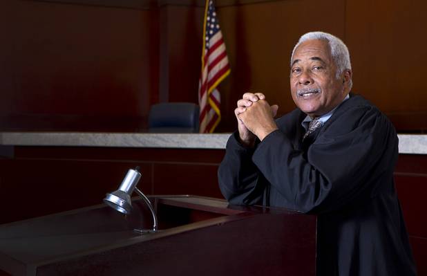 Nevada Supreme Court Justice Michael L. Douglas poses in his courtroom Tuesday, Feb. 21, 2017. .