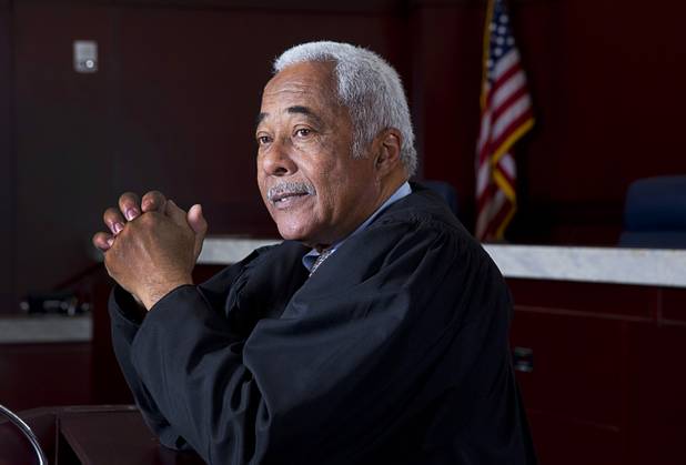 Nevada Supreme Court Justice Michael L. Douglas poses in his courtroom Tuesday, Feb. 21, 2017. .