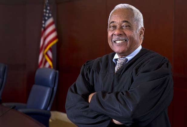 Nevada Supreme Court Justice Michael L. Douglas poses in his courtroom Tuesday, Feb. 21, 2017. .
