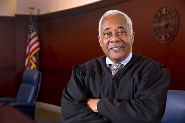 Nevada Supreme Court Justice Michael L. Douglas poses in his courtroom Tuesday, Feb. 21, 2017. .