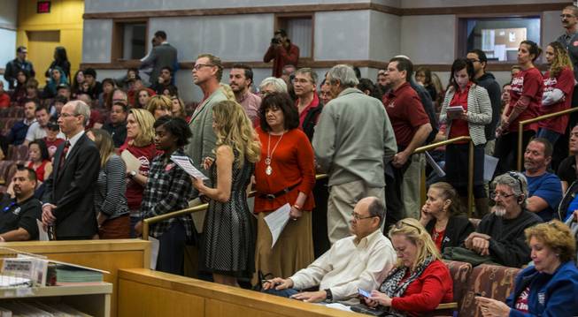 Many speaking on behalf of Save Red Rock wait their turn before the Clark County Commission now taking up the Blue Diamond housing project near Red Rock on Wednesday, February 22, 2017.