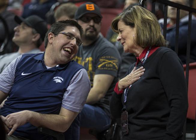 UNLV athletic director Tina Kunzer-Murphy chats up an attendee as UNLV battles UNR during their game at the Thomas & Mack Center on Saturday, February 25, 2017.