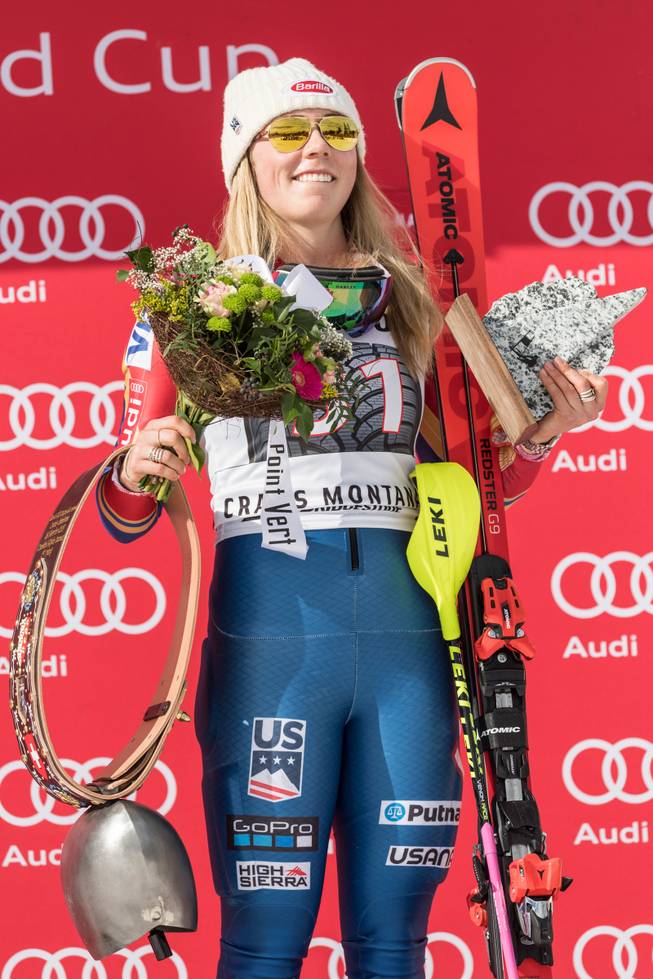 Winner Mikaela Shiffrin of the U.S. poses on the podium Sunday, Feb. 26, 2017, after the women's alpine combined competition at the Alpine Skiing World Cup in Crans-Montana, Switzerland.
