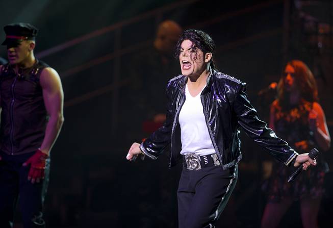 Damian Brantley performs as Michael Jackson during a debut of ...