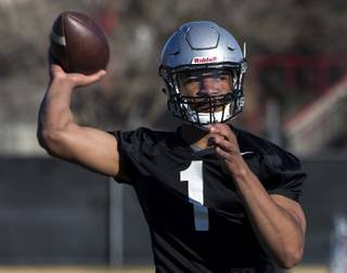 UNLV QB Armani Rogers looks to his receiver during UNLV's first spring practice of the year on Wednesday, March 1, 2017.
