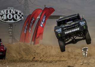 Seven time national off-road racing Champion Ballistic BJ Baldwin flies through the air during the unlimited start of the 2017 Mint 400 about Jean and Primm, Nevada, with hundreds of vehicles in limited and unlimited race on Saturday, March 4, 2017.