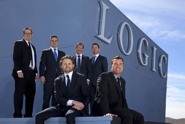 Owners of Logic Commercial Real Estate, 3900 S. Hualapai Way, pose on the top of their offices Wednesday, March 8, 2017. In front: Sean Margulis, left, and Jason Otter. Back row from left: Chris Richardson, Brendan Keating, Agus Alamsjah and Adam Malan. 