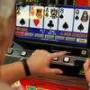 Angela Ingerson plays a poker slot machine as part of cognitive and physical rehab for patients at the HealthSouth Rehabilitation Hospital of Henderson on Thursday, March 9, 2017.
