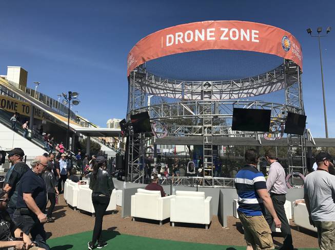 The Drone Zone at  CONEXPO-CON/AGG 2017 features an obstacle course to give attendees an opportunity to see how drones operate. Attendees were invited to wear a first-person viewer headpiece, similar to a virtual reality headpiece.