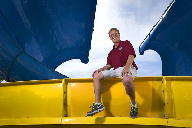 Shane Huish, general manager of Cowabunga Bay, poses by the new 60-feet-tall Wild Surf ride at the water park in Henderson Monday, March 13, 2017. 