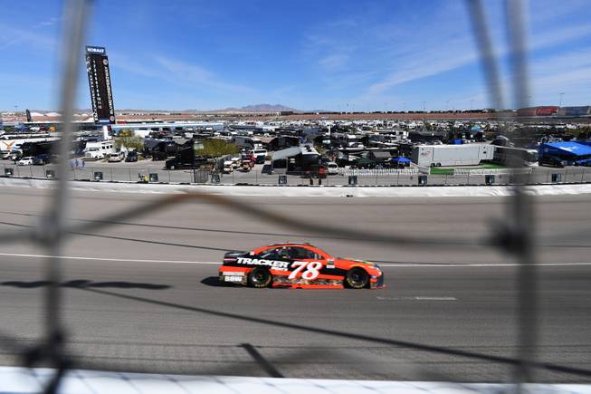 Martin Truex Jr. makes his way through turn one during the Monster Energy NASCAR Cup Series Kobalt 400 Sunday, March 12, 2017, at the Las Vegas Motor Speedway.