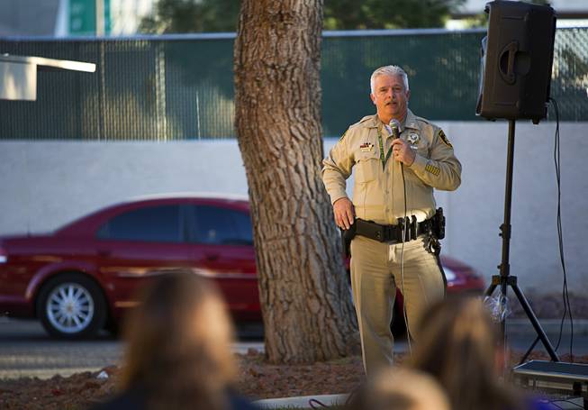 Metro Police Capt. Rich Fletcher speaks to residents during a ...