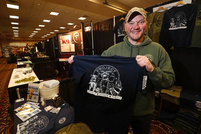 Jason Johnson, founder of Project K9 Hero, poses during the annual Police K-9 Conference and Vendor Show at the Tuscany Thursday, March 16, 2017. The nonprofit organization (projectk9hero.org) provides care to retired law enforcement and military working dogs.