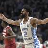 North Carolina's Joel Berry II (2) reacts after making a three-point basket against Arkansas during the first half in a second-round game of the NCAA men's college basketball tournament in Greenville, S.C., Sunday, March 19, 2017. 