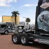 Trucks decorated by the Laborers Union, Local 872, are parked in the median of Las vegas Boulevard South near the Welcome to Las Vegas sign as NFL owners in Phoenix voted to approve a Raiders move to Las Vegas Monday, March 27, 2017.