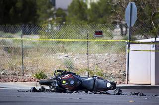 A motorcycle is shown on West Flamingo Road near Durango Drive after an accident Wednesday, March 29, 2017.