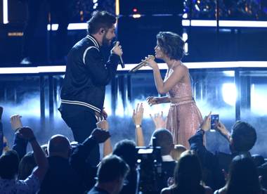 Thomas Rhett, left, and Maren Morris perform “Craving You” at the 52nd annual Academy of Country Music Awards at the T-Mobile Arena on Sunday, April 2, 2017, in Las Vegas.