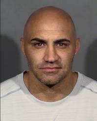 This Metro Police booking photo shows Bishop Gorman High football coach Kenny Sanchez, who was arrested Tuesday, April 4, 2017, on a warrant in a misdemeanor domestic battery case.