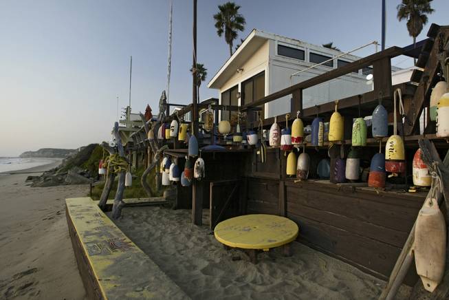 Buoys hang from the deck of a home in the El Morro Village mobile home park in Crystal Cove State Park.